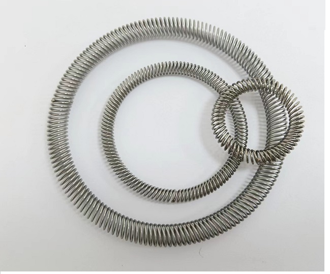 泛塞封觸指彈簧