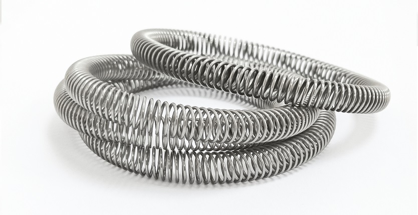 斜圈觸指彈簧，